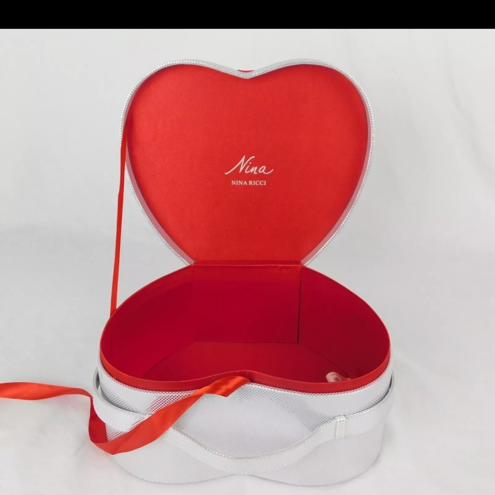 Nina Ricci Silver and Red Heart-Shaped Accessory